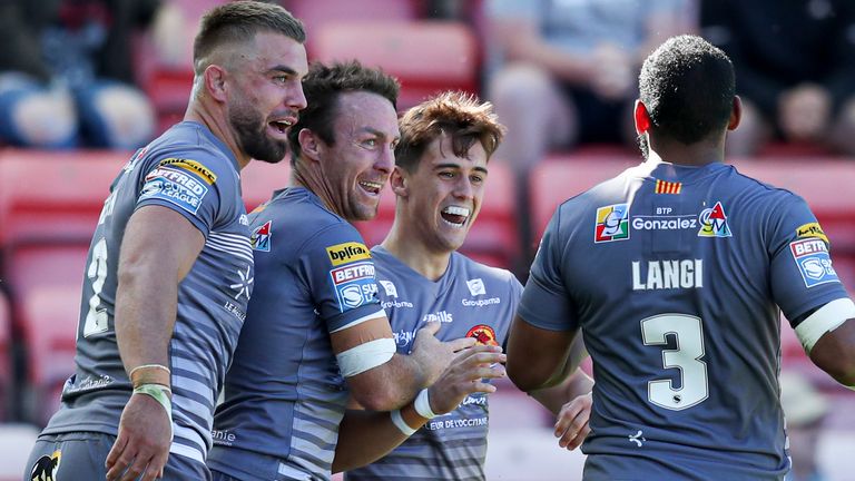 Catalans celebrate Arthur Mourgue's try against Leigh