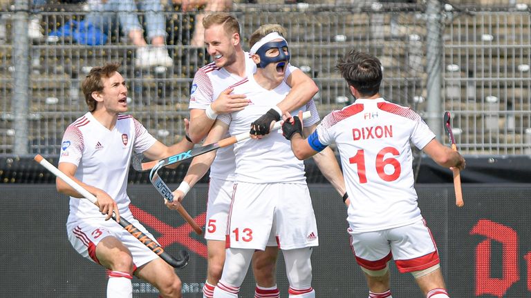 Sam Ward (13) of England celebrates after scoring his team's first goal during the Euro Hockey Championships Men's match against Belgium. (Getty)
