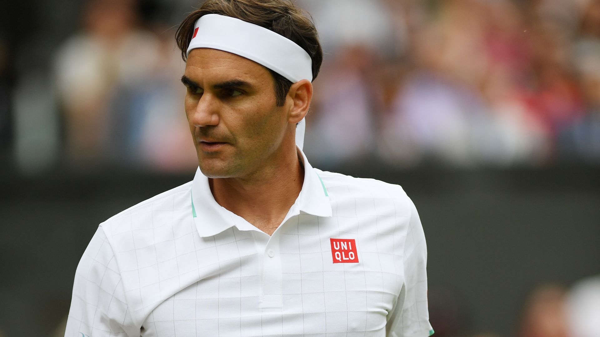 Federer sees off brave Norrie to progress at Wimbledon