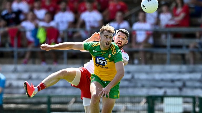 Stephen McMenamin of Donegal in action against Matthew Donnelly of Tyrone