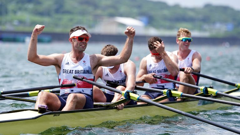 Great Britain's Harry Leask, Angus Groom, Tom Barras and Jack Beaumont celebrate winning silver in the men's quadruple Sculls