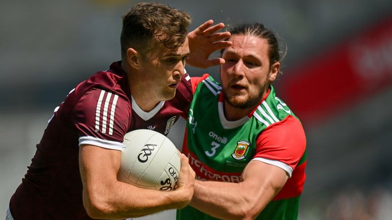 Robert Finnerty of Galway in action against Padraig O'Hora of Mayo