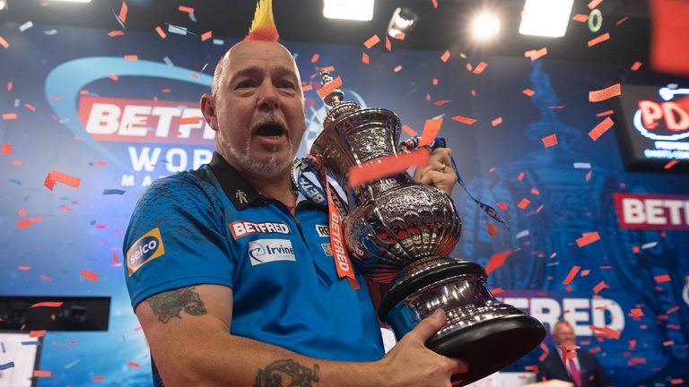 Wright finally lifted the Phil Taylor Trophy, four years on from losing to 'The Power' in the 2017 finale