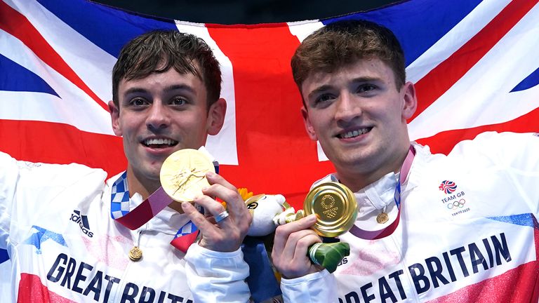 Tom Daley and Matty Lee pictured with their gold medals at the Tokyo Games