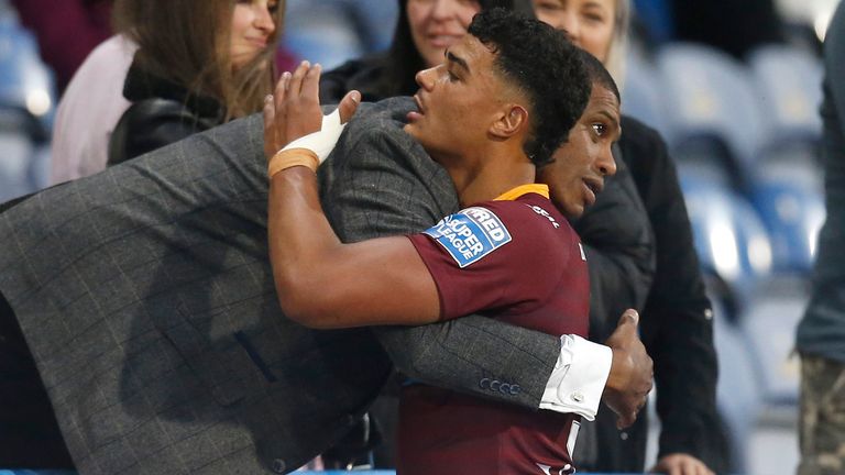 Huddersfield's Will Pryce is congratulated by his father and former Super League star Leon