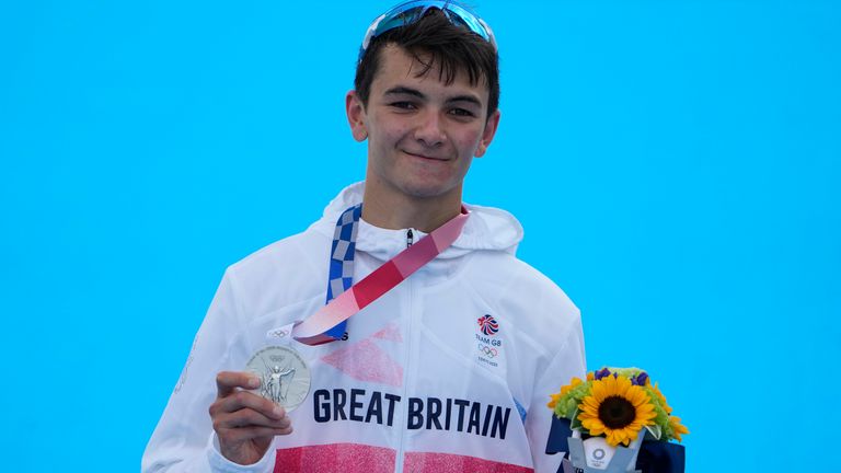 Alex Yee of Great Britain holds his silver medal (AP)