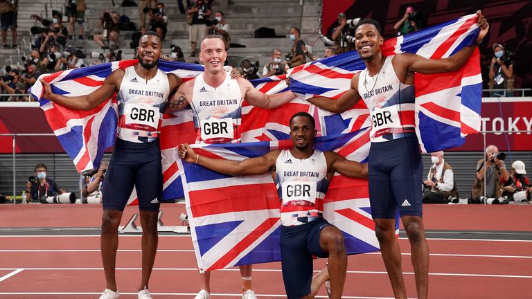 (Left to right) Nethaneel Mitchell-Blake, Eichard Kilty, CJ Ujah and Zharnel Hughes celebrate their silver medal 