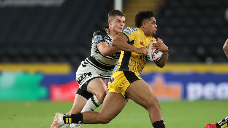 Derrell Olpherts looks to get past  Hull FC's Cameron Scott