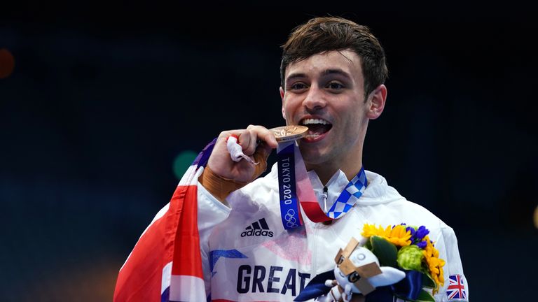 Tom Daley says winning a fourth Olympic medal has made him feel 'extremely happy and overwhelmed' and admits his bronze in the individual 10m platform final was 'unexpected'