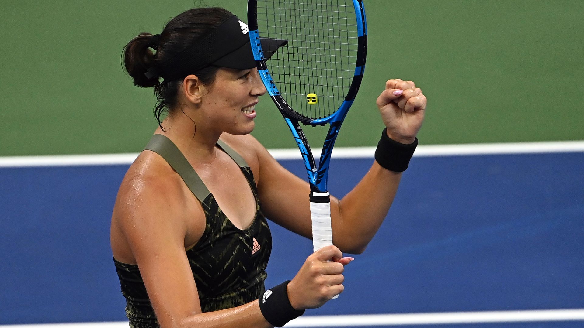 Muguruza sets up Azarenka blockbuster clash