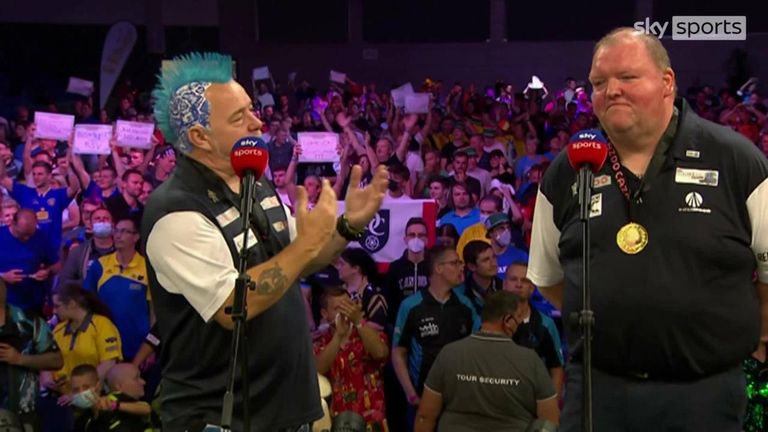 John Henderson and Peter Wright give their reactions after winning the World Cup. 