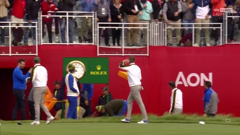 The European team arrived at the first tee wearing 'cheeseheads' - the nickname associated with Green Bay Packers fans - only for Ian Poulter to fail in his attempt to throw his foam hat into the crowd!