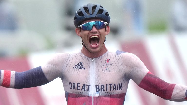 Great Britain's Ben Watson celebrates winning the men's C1-3 road race