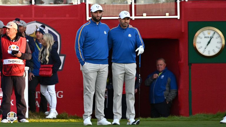 Rahm and Garcia on the first tee in the early-morning Wisconsin sunshine