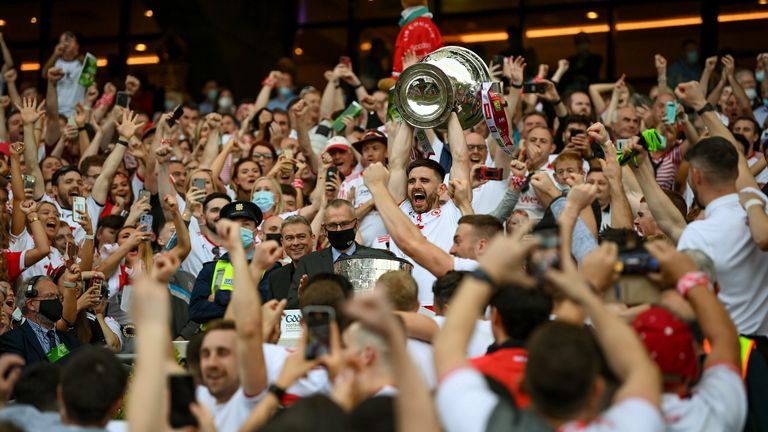 Pádraig Hampsey lifts the Sam Maguire Cup