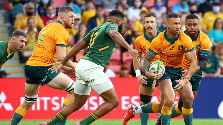 Quade Cooper runs with the ball for the Wallabies