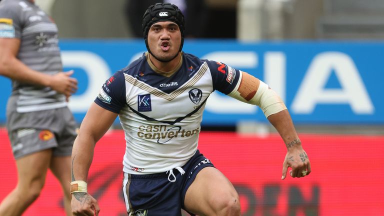 Sione Mata'utia celebrates after scoring one of his two tries for St Helens