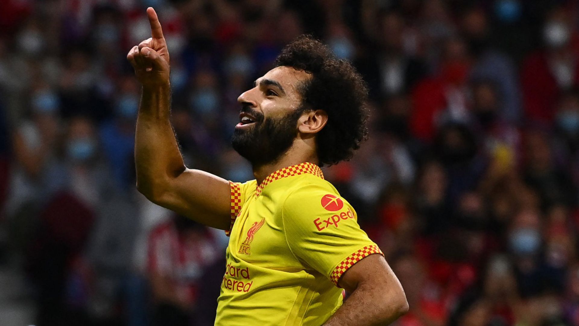 Salah scores twice as Liverpool edge thriller at 10-man Atletico