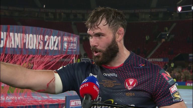 Alex Walmsley revealed how proud he is of the St Helens organisation before running off for a photo opportunity following last year's Grand Final triumph