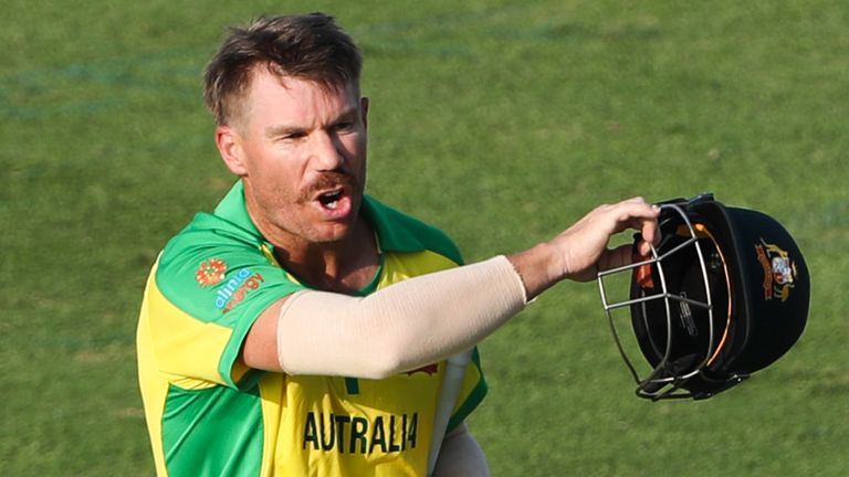 Australia's David Warner walks off following his dismissal against South Africa at the T20 World Cup (Associated Press)