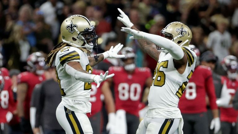 P.J. Williams intercepts a Tom Brady throw and runs into the endzone late in the fourth quarter to clinch a Saints win over the Buccaneers. 