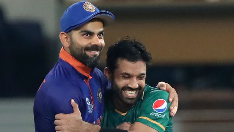 Kohli embraces Mohammad Rizwan following Pakistan's 10 wicket-win over India in Dubai