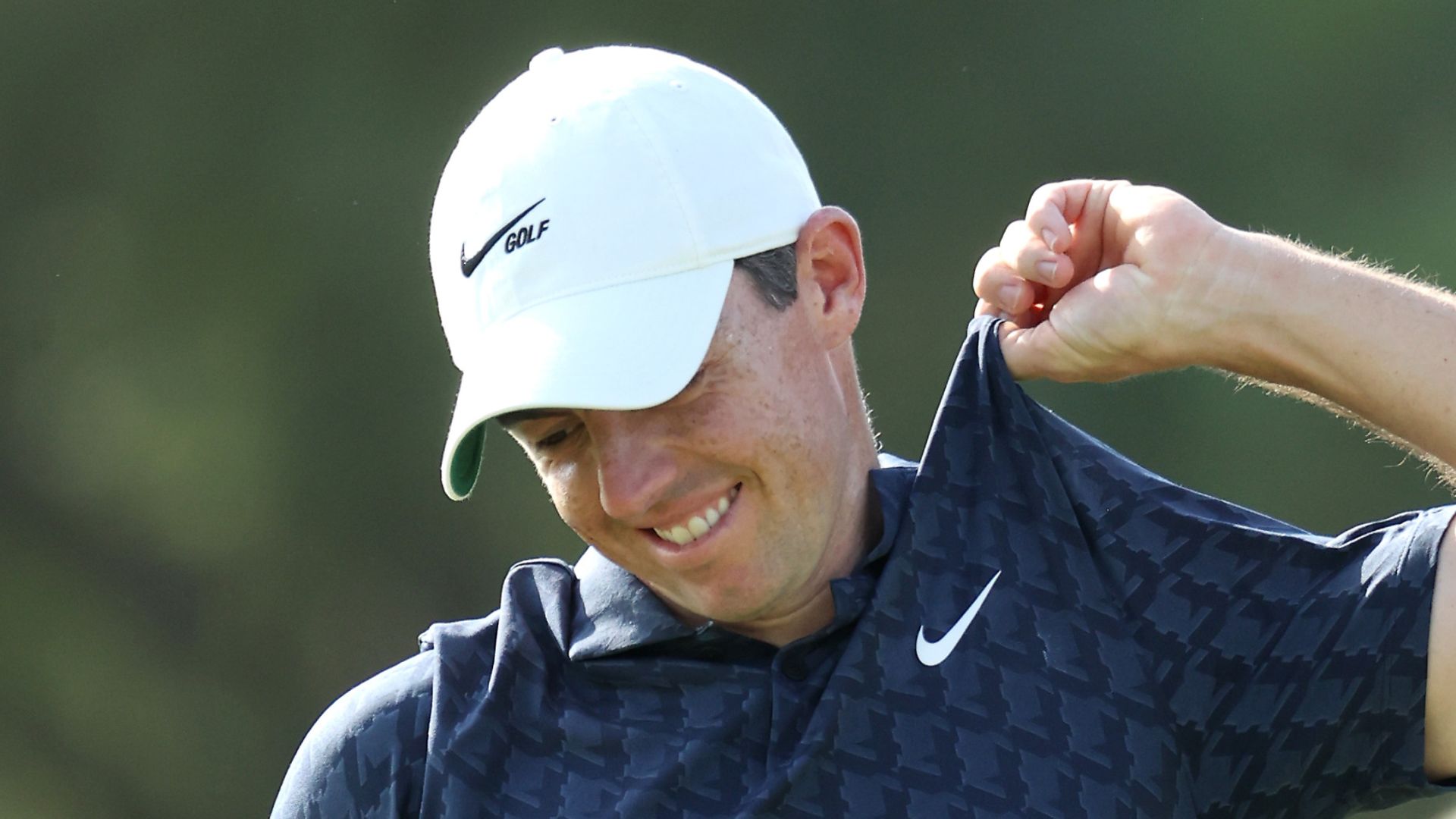 Rory in a rage with ripped shirt in Dubai