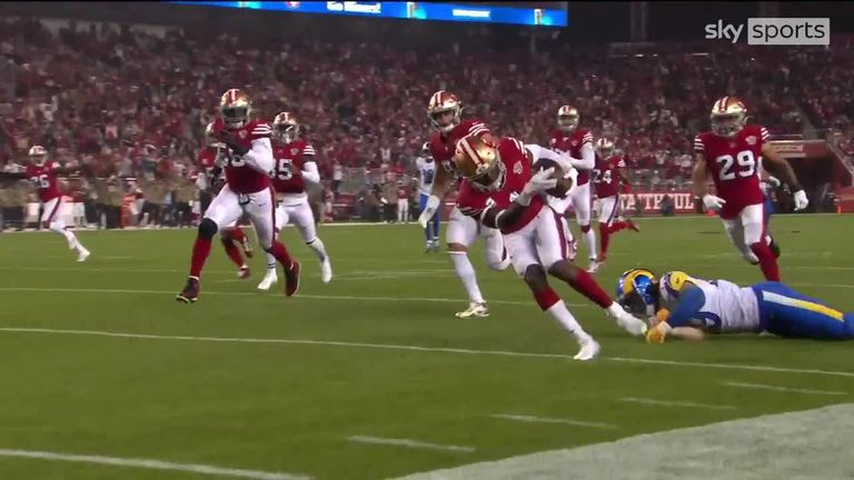 San Francisco 49ers safety Jimmie Ward scores a 27-yard touchdown on his second interception of the first quarter.