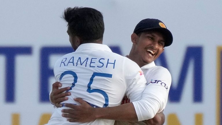 Off-spinner Ramesh Mendis (left) took 11 wickets across the match
