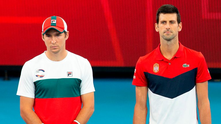 Dusan Lajovic (left) says Novak Djokovic's absence from the ATP Cup is unfortunate