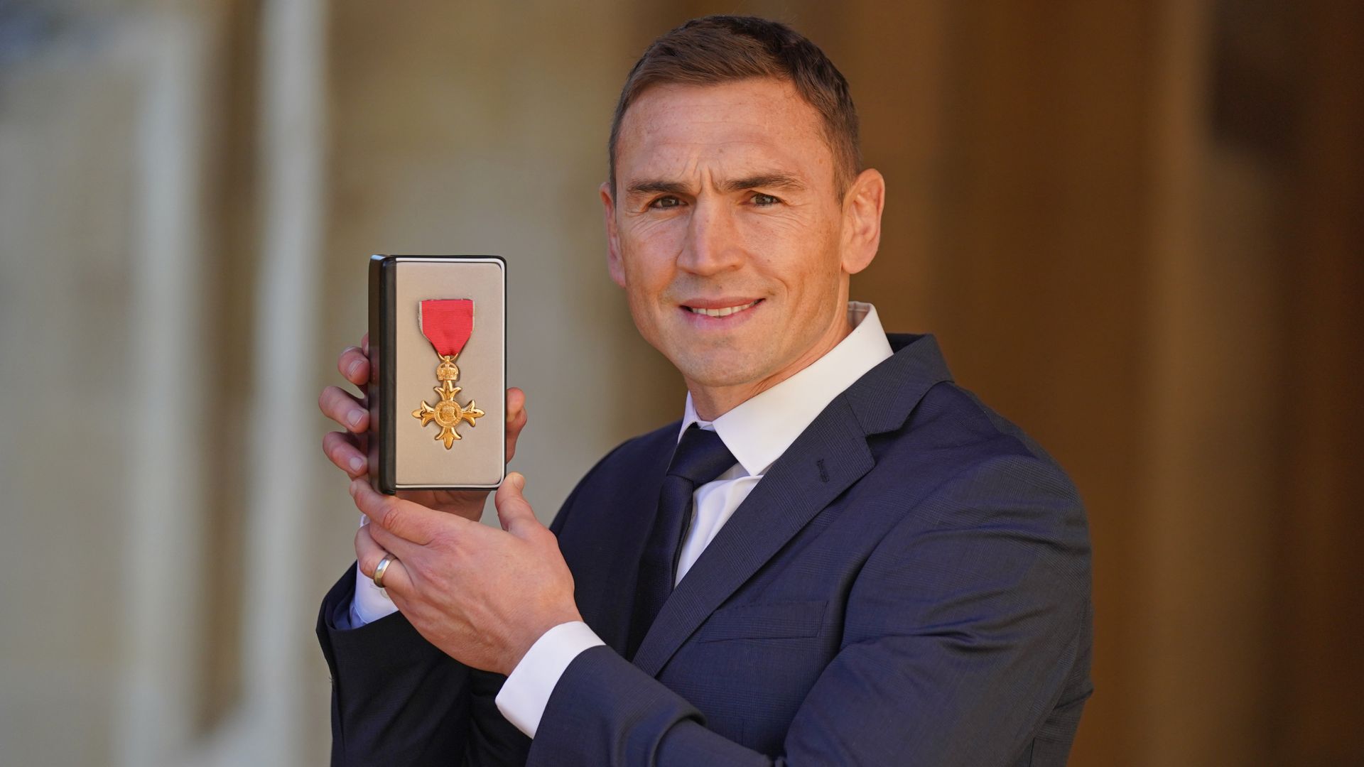 Sinfield plans third challenge after OBE award