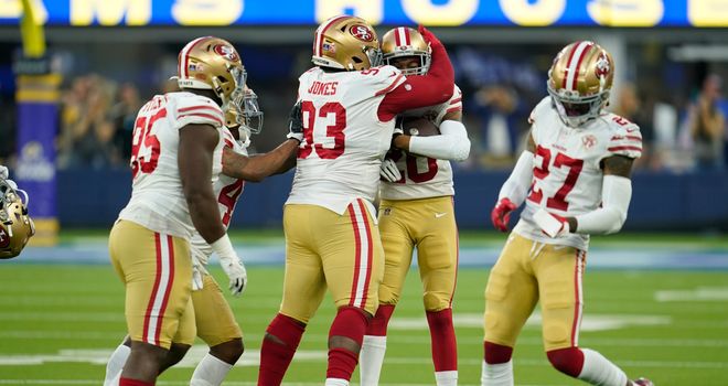 49ers clinch playoff berth by holding off Rams 27-24 in OT