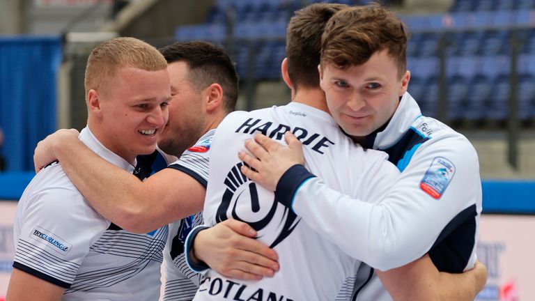 Mouat and Hardie share a hug as team-mates Lammie and McMillan also celebrate after Scotland's victory over Sweden in last year's European Curling Championships final in Lillehammer