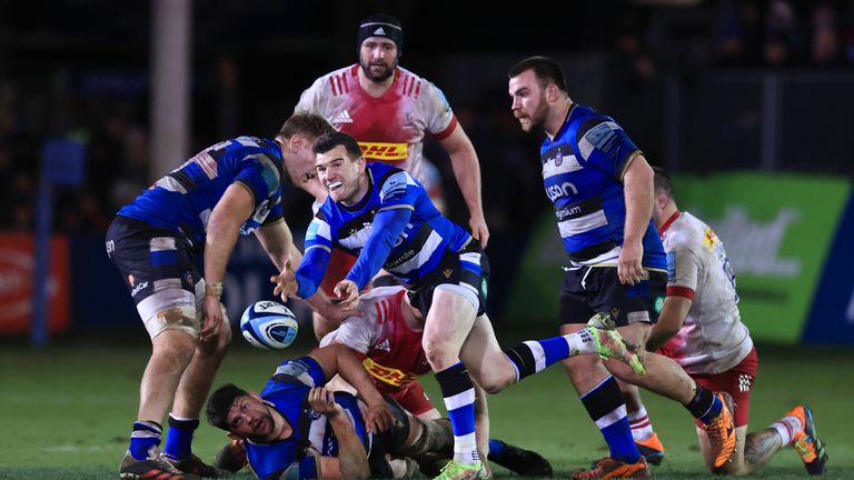 Ben Spencer of Bath passes the ball 