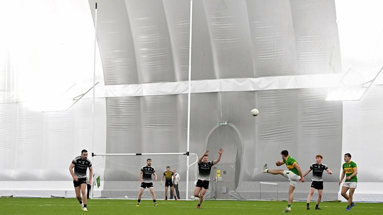 Cillian McGloin of Leitrim kicks a point