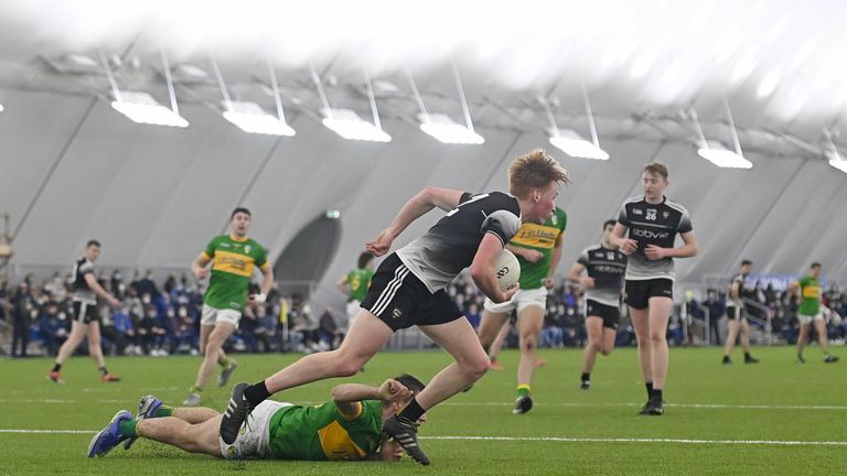 Evan Lyons of Sligo in action against Darragh Rooney of Leitrim at the Connacht GAA Air Dome