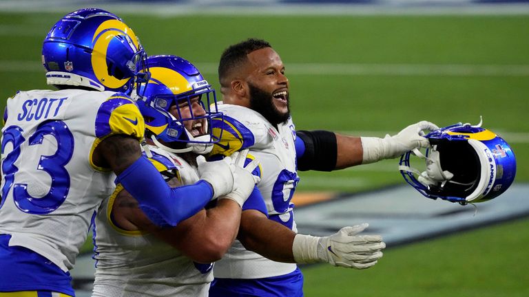 Los Angeles Rams defender Aaron Donald celebrates with teammates after their Super Bowl LVI win over the Cincinnati Bengals