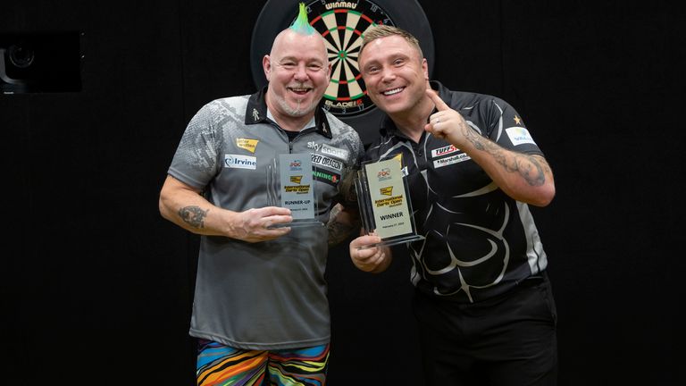 Peter Wright (left) will now have to wait until the UK Open next weekend for his next shot at becoming world No.