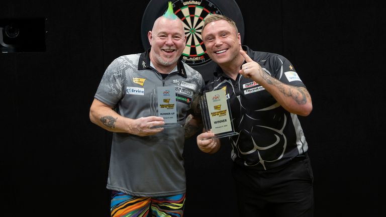 Peter Wright (left) will now have to wait until next weekend's UK Open for his next chance of becoming world No 1