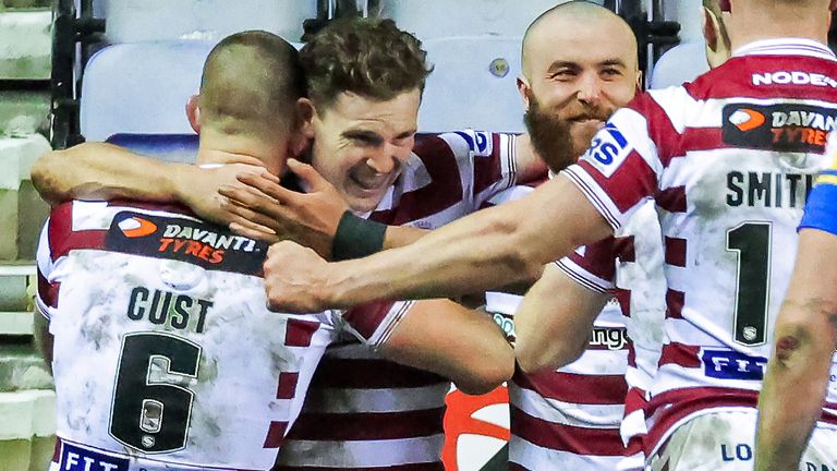 Wigan celebrate a try against Leeds in their Super League win