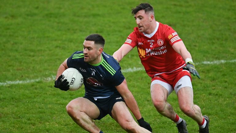Ben McCormack of Kildare in action against Cormac Monroe of Tyrone