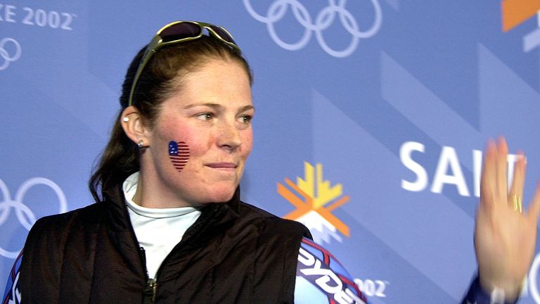 Picabo Street of the United States waves goodbye after she retires in 2002