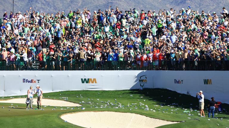 Cans and bottles were thrown by fans in celebratory mood after Sam Ryder's hole-in-one