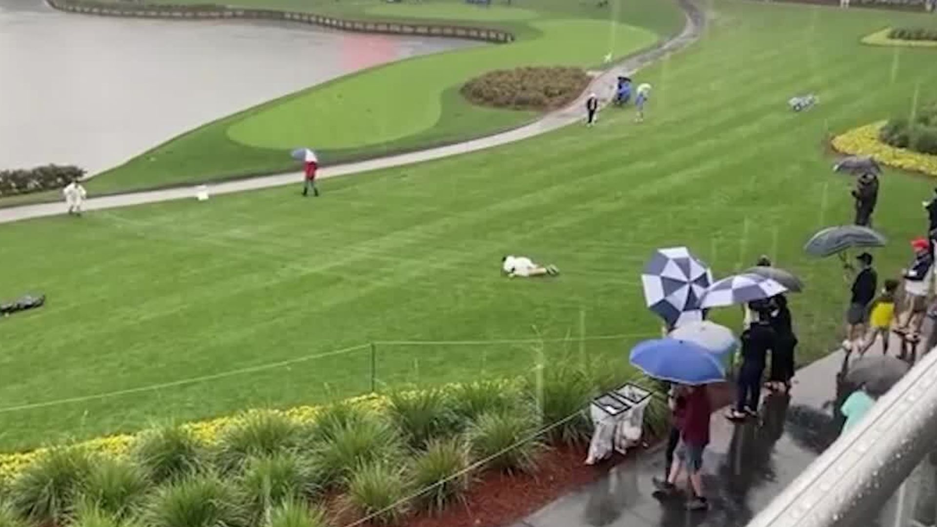 Fans create water slide on Sawgrass fairway!