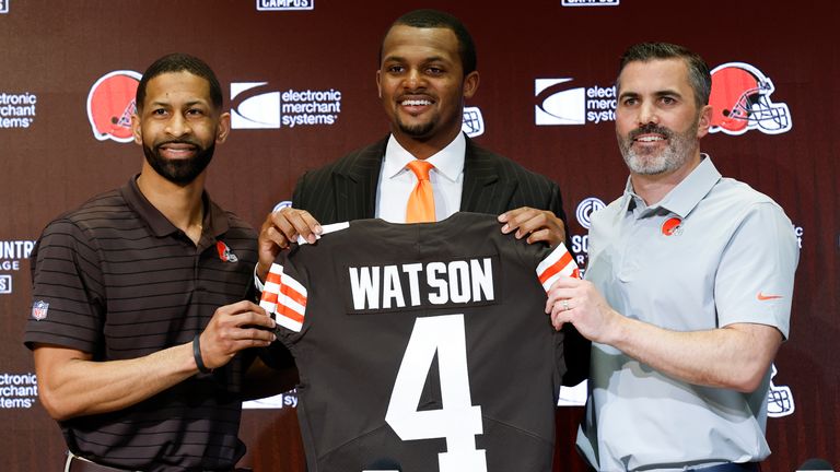 Browns general manager Andrew Berry and head coach Kevin Stefanski with new signing Deshaun Watson