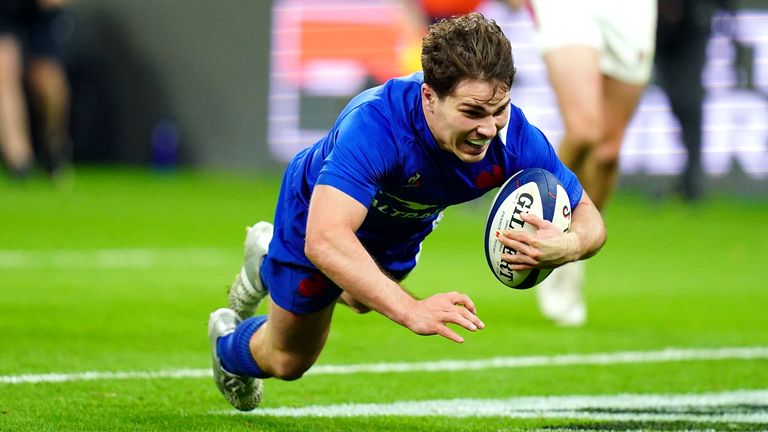 France's Antoine Dupont scores his side's third try