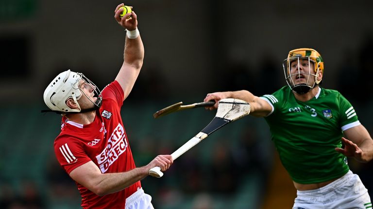 Patrick Horgan fields the sliotar despite the attention of Dan Morrissey