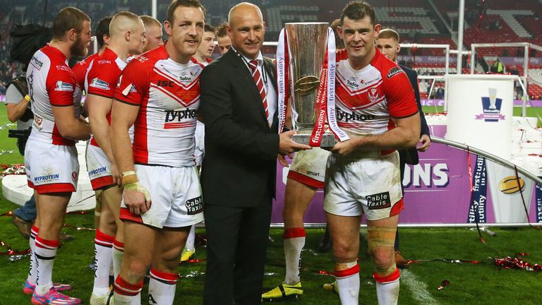 Super League Grand Final 2014: James Roby lifts the Super League trophy alongside Nathan Brown and club captain Paul Wellens