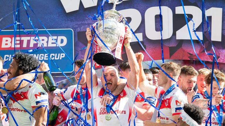 Celebration: James Roby lifts the Challenge Cup trophy for St. Helens in 2021, on the club's first win at Wembley since 2008. 