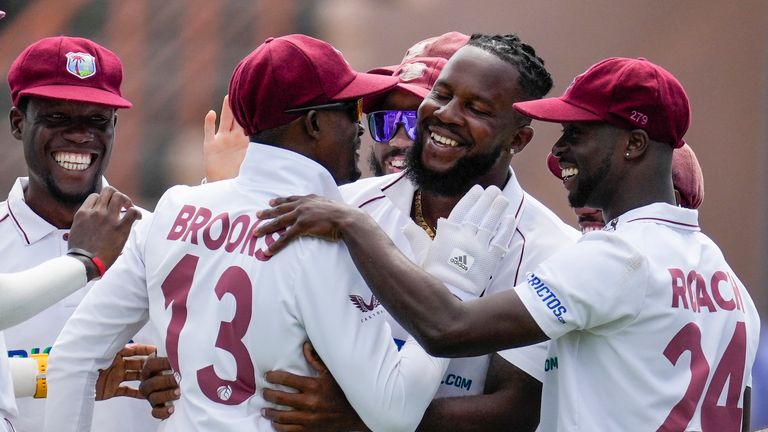 Kyle Mayers celebrates one of his five second-innings wickets to leave him with match figures of 7-22 for the West Indies